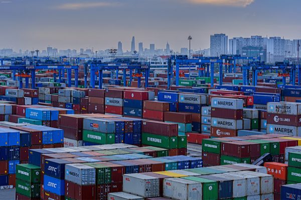 Shipping containers at a port in Ho Chi Minh City. Photo by Shutterstock/Igor Grochev.